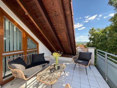 Teilueberdachter Balkon